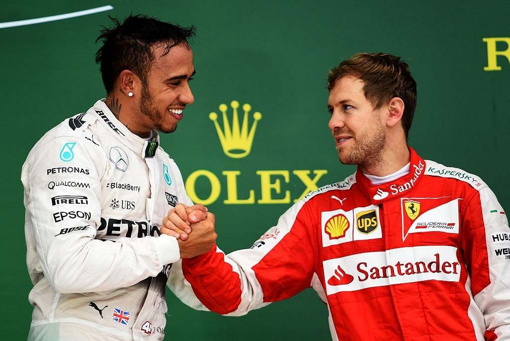 Lewis Hamilton shows his concern for Sebastian Vettel