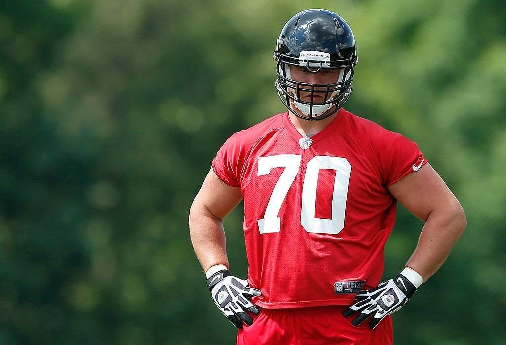 Rookie offensive tackle Jake Matthews #70 of the Atlanta Falcons runs drills during rookie minicamp at the Atlanta Falcons Training Facility on May 16, 2014 in Flowery Branch, Georgia.