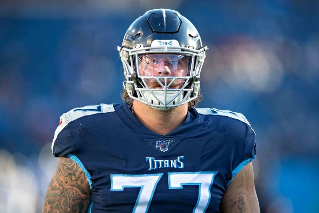 Taylor Lewan #77 of the Tennessee Titans warms up before a game against the Jacksonville Jaguars at Nissan Stadium on November 24, 2019 in Nashville, Tennessee. The Titans defeated the Jaguars 42-20.