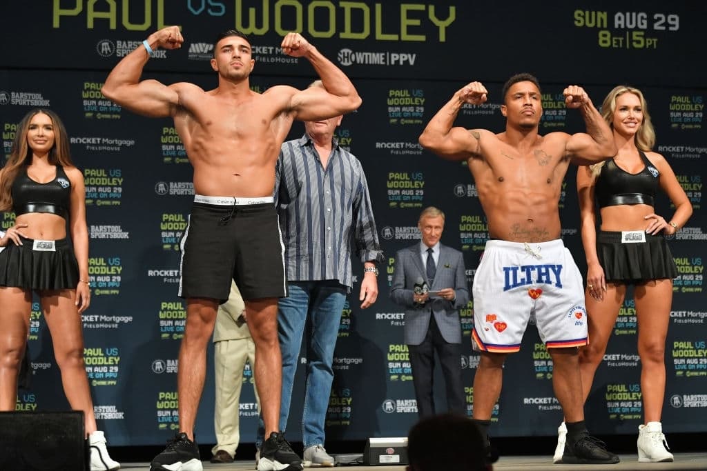 Tommy Fury and Anthony Taylor pose during the weigh in event