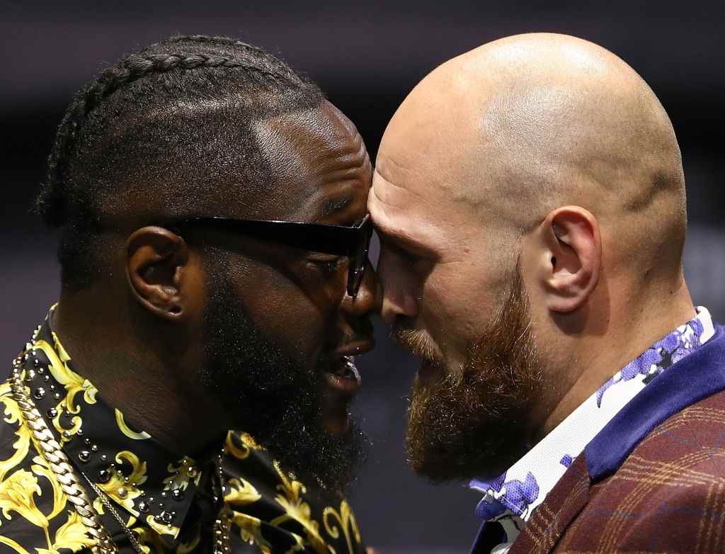 Tyson Fury and Deontay Wilder headbutt