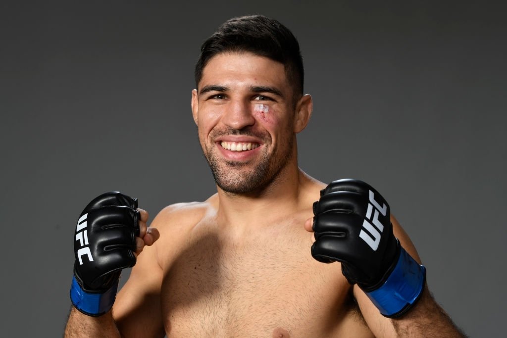 Vicente Luque of Brazil poses for a post fight portrait backstage during the UFC 265 event at Toyota Center on August 07, 2021 in Houston, Texas.