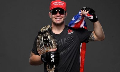 Colby Covington Posing with his title