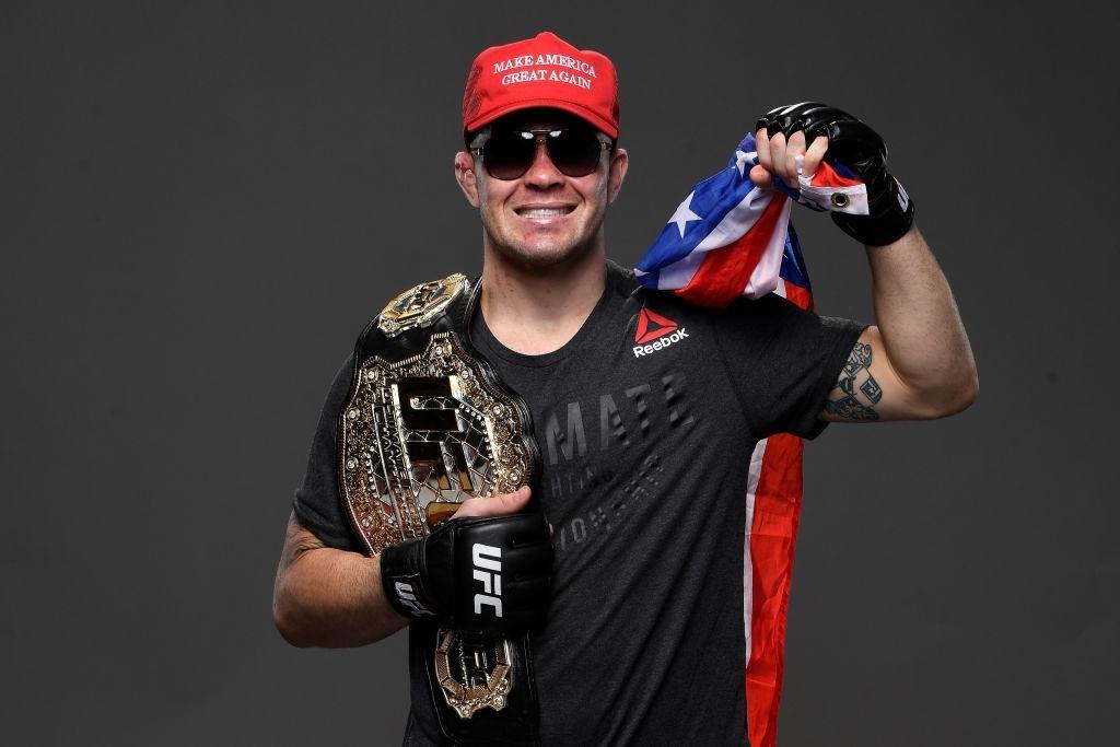 Colby Covington Posing with his title