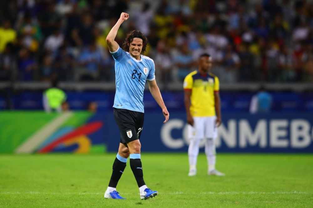 JUNE 16: Edinson Cavani of Uruguay celebrates scoring his side's second goal during the Copa America Brazil 2019 group C match between Uruguay and Ecuador at Mineirao Stadium on June 16, 2019 in Belo Horizonte, Brazil. (Photo by Chris Brunskill/Fantasista/Getty Images)