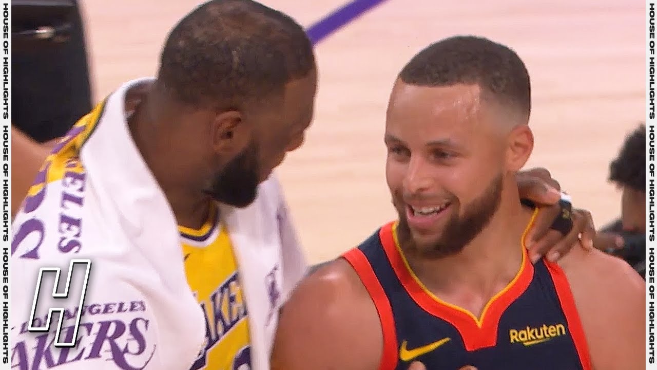 LeBron James Stephen Curry hug