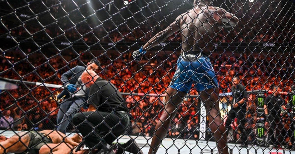 Israel Adesanya celebrates his win