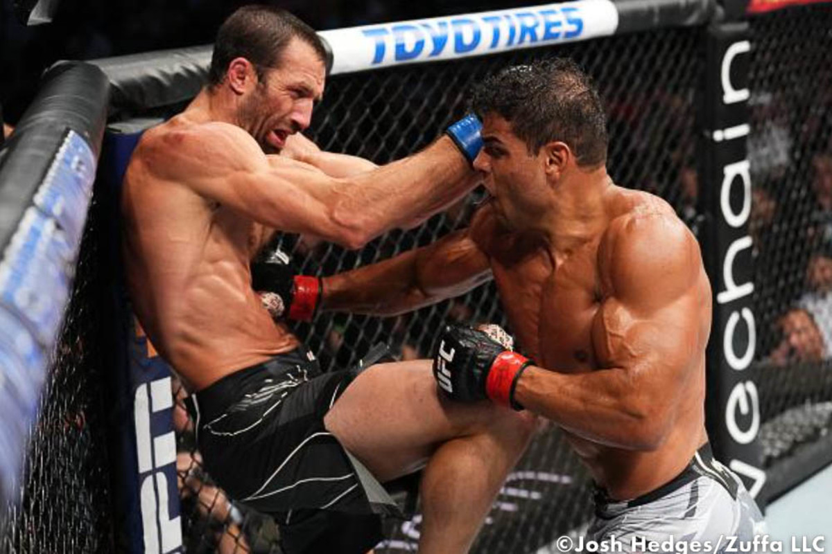 Paulo Costa punches Luke Rockhold