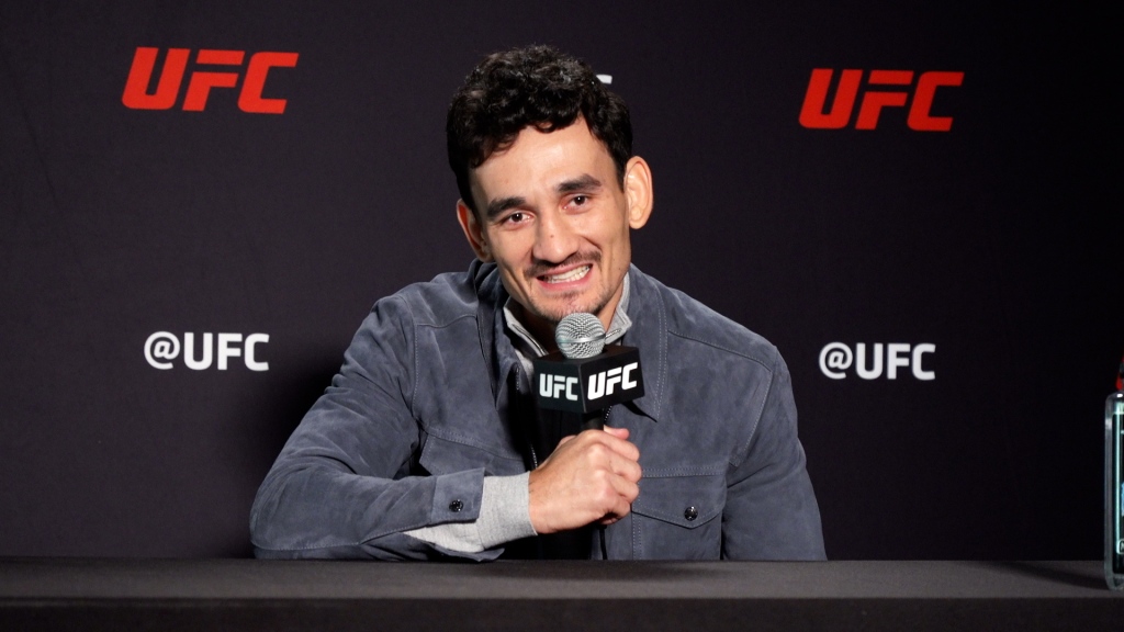 Max Holloway speaking at a media interview