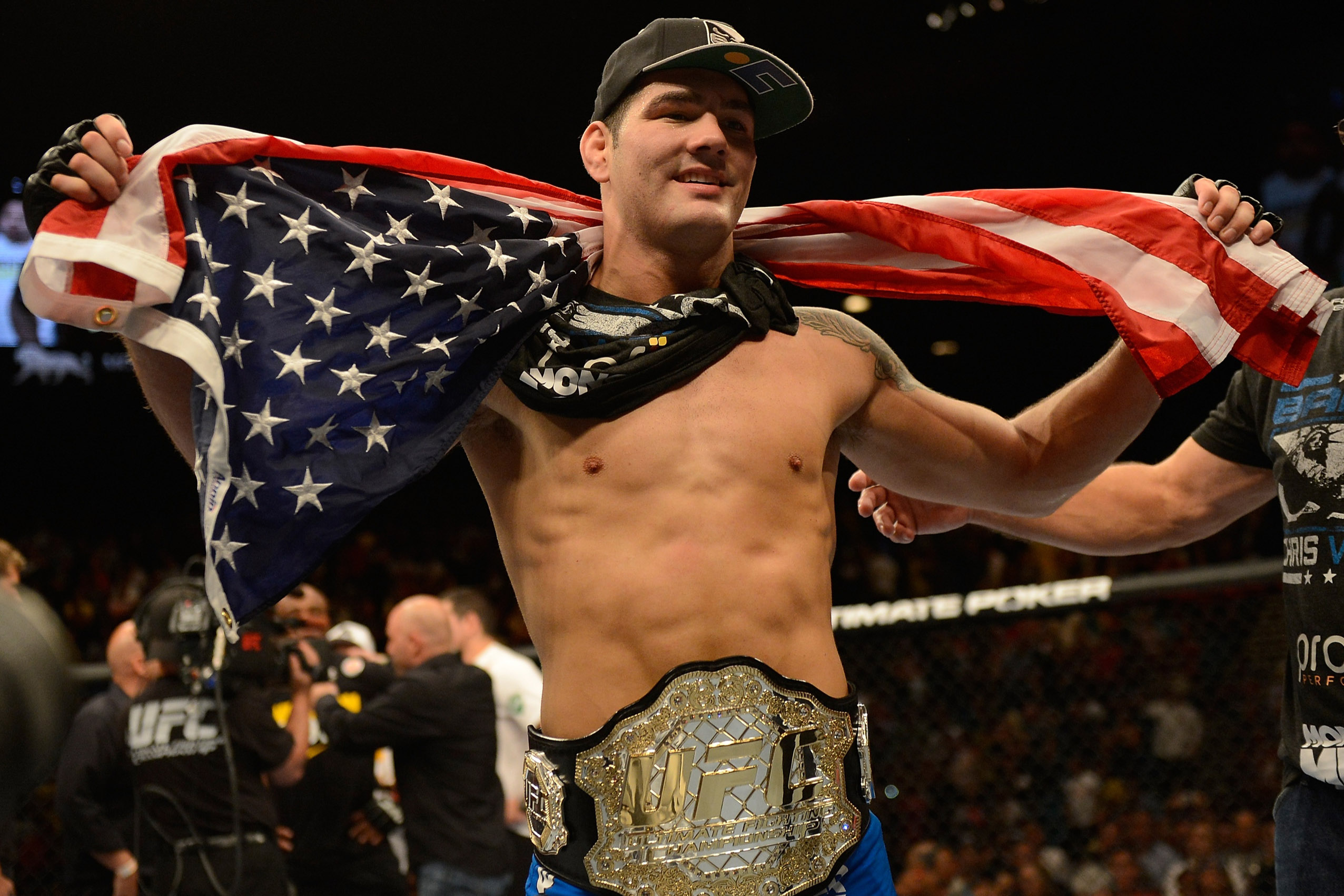 Chris Weidman celebrating his title win