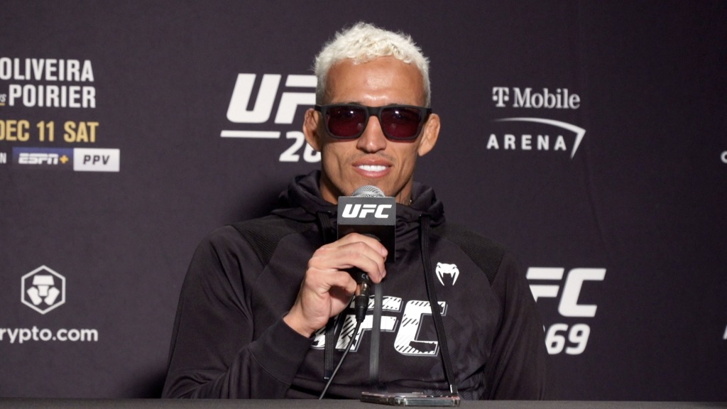 Charles Oliveira speaking at a press conference