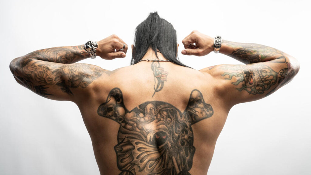 Damien Priest with a new tattoo in his back