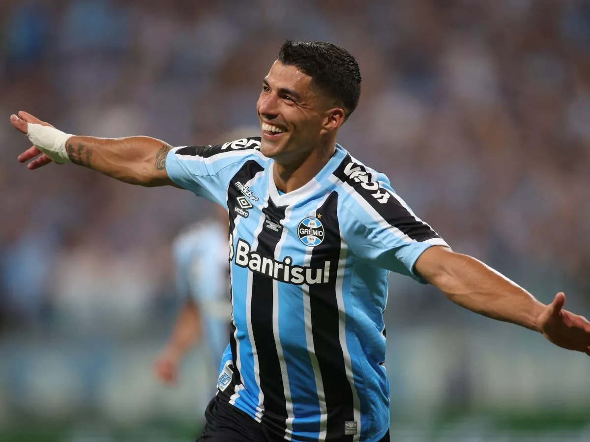 Luis Suarez marked his Gremio debut with a hat-trick