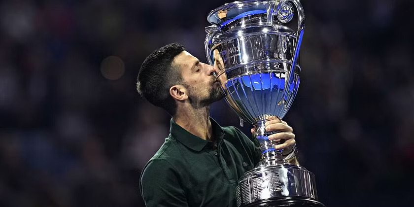 Novak Djokovic with 2023 world no. 1 trophy