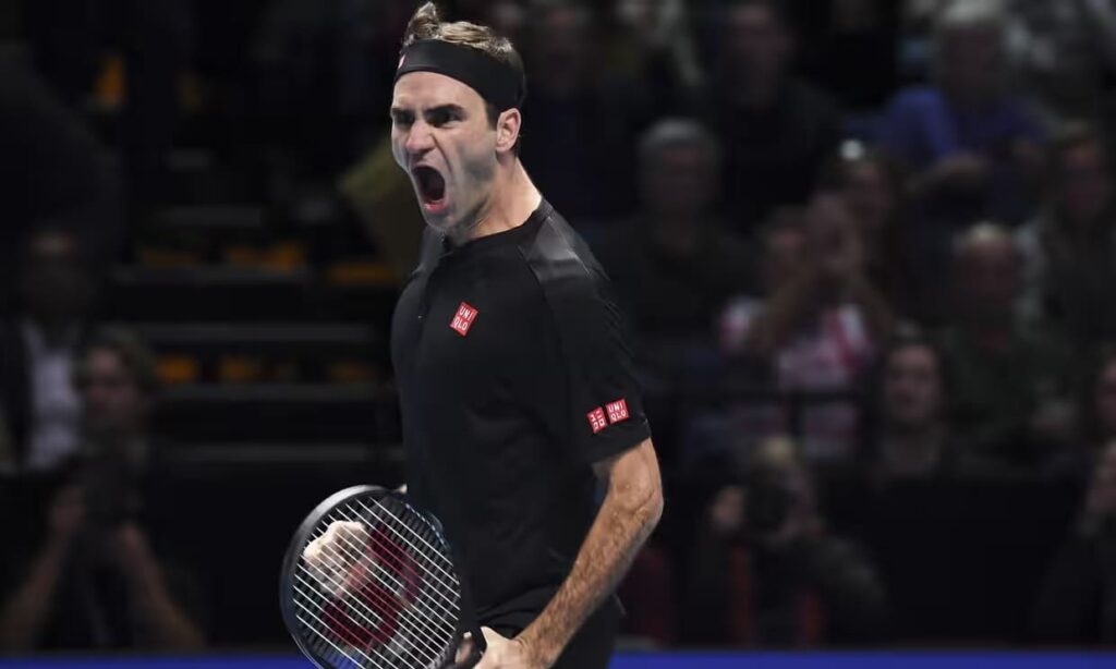 Roger Federer celebrating match point against Novak Djokovic