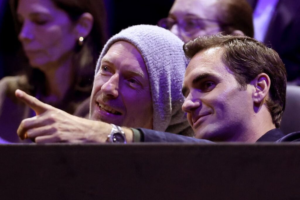 Roger Federer sitting in stands of Andrea Bocelli concert
