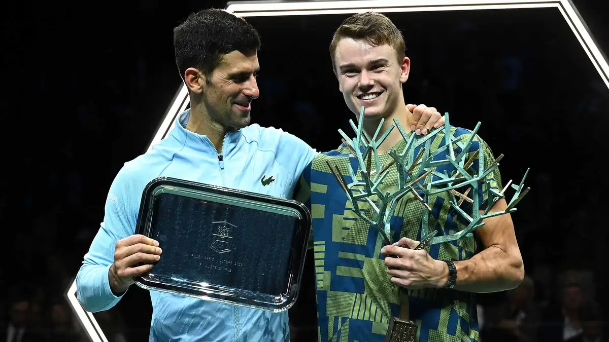 Novak Djokovic congratulates Holger Rune on his first ATP Masters 1000 title in Paris