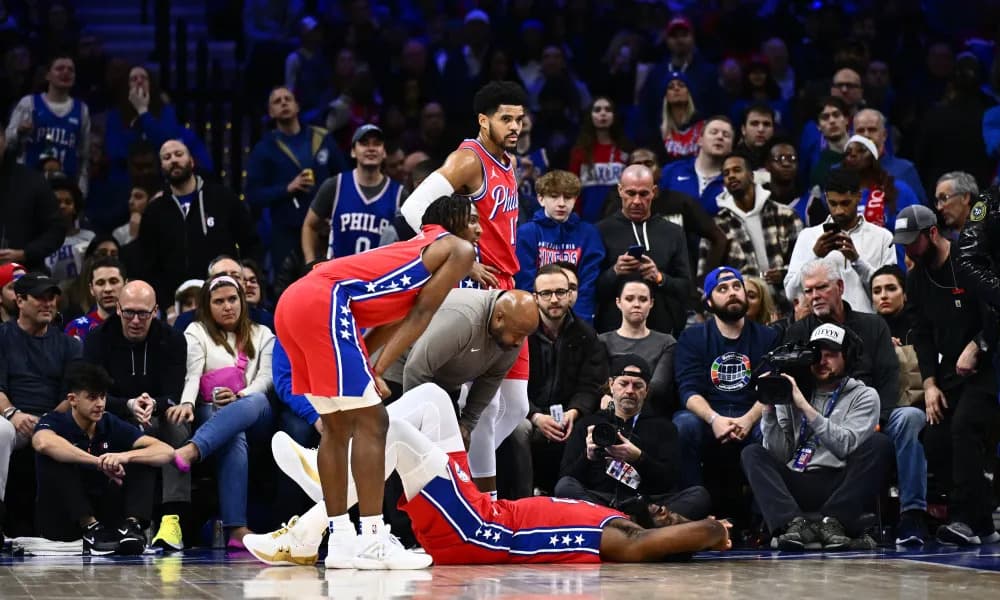 The Philadelphia 76er's star MVP Joel Embiid meets with a right ankle injury.