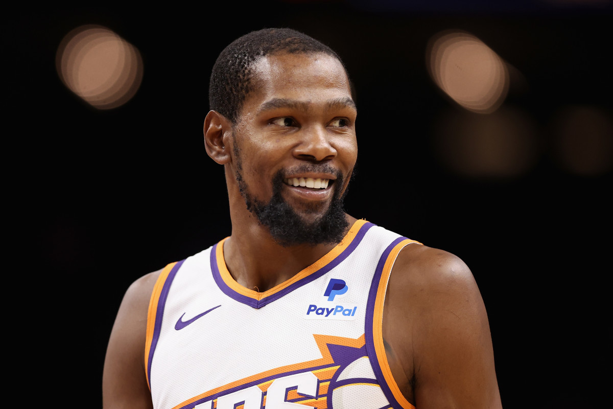 Kevin Durant responds to Woj reports.