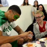 What is the Jayson Tatum Foundation receiving $1million to help low-income, single-parent families?