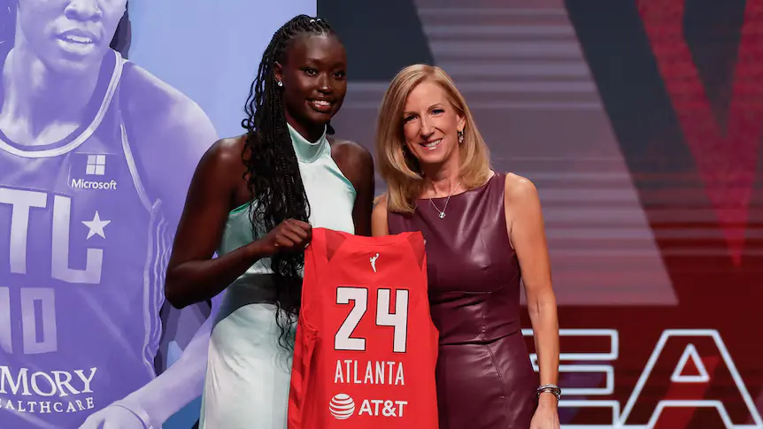 Nyadiew Puoch heads the Australian group as they are happy for WNBA draft success