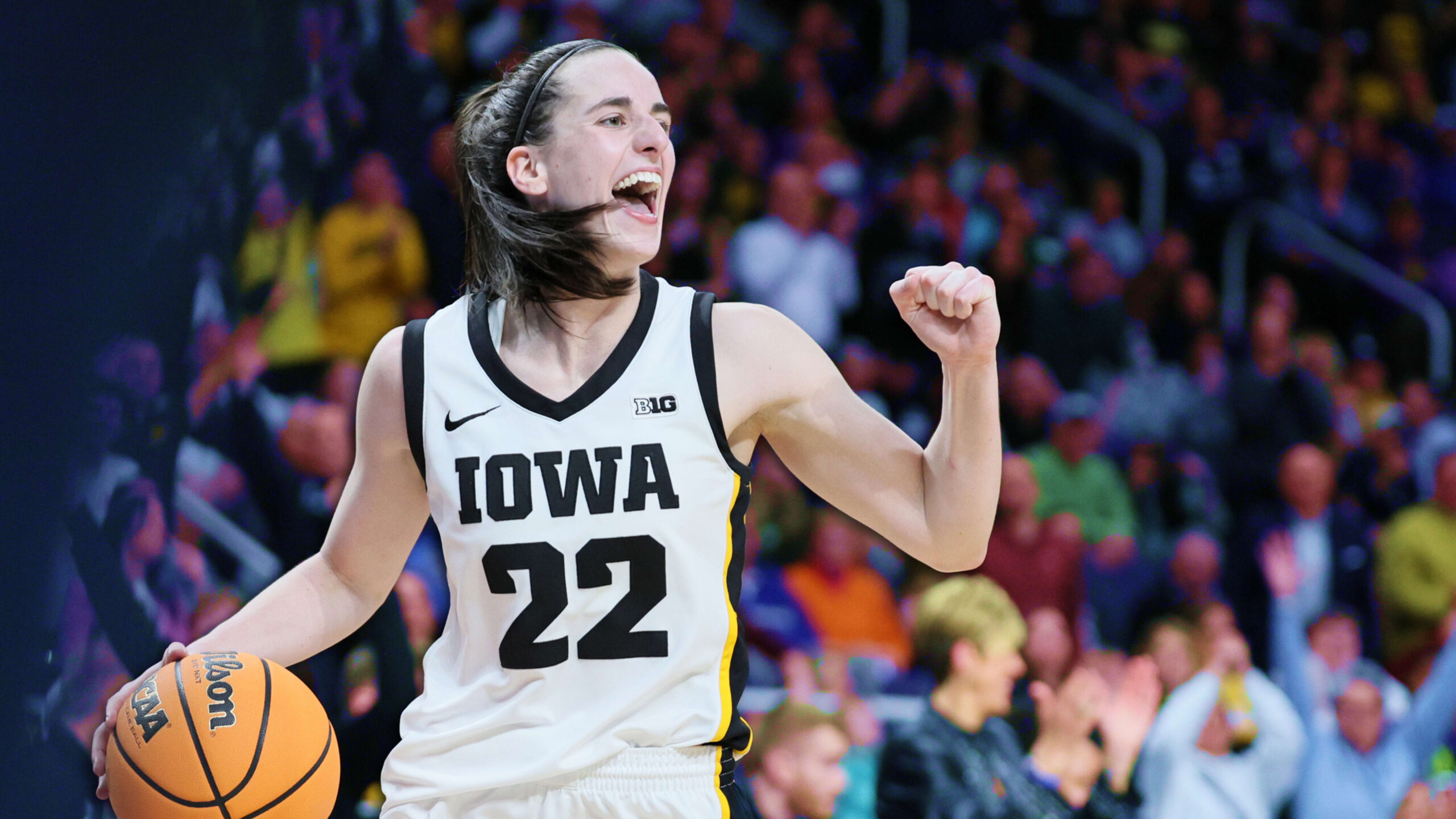 Which NCAA tournament record did Iowa ace Caitlin Clark break en route to championship game?